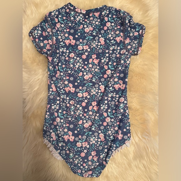 Ruffle Butts Short Sleeve Rash Guard One Piece - Picture 3 of 3